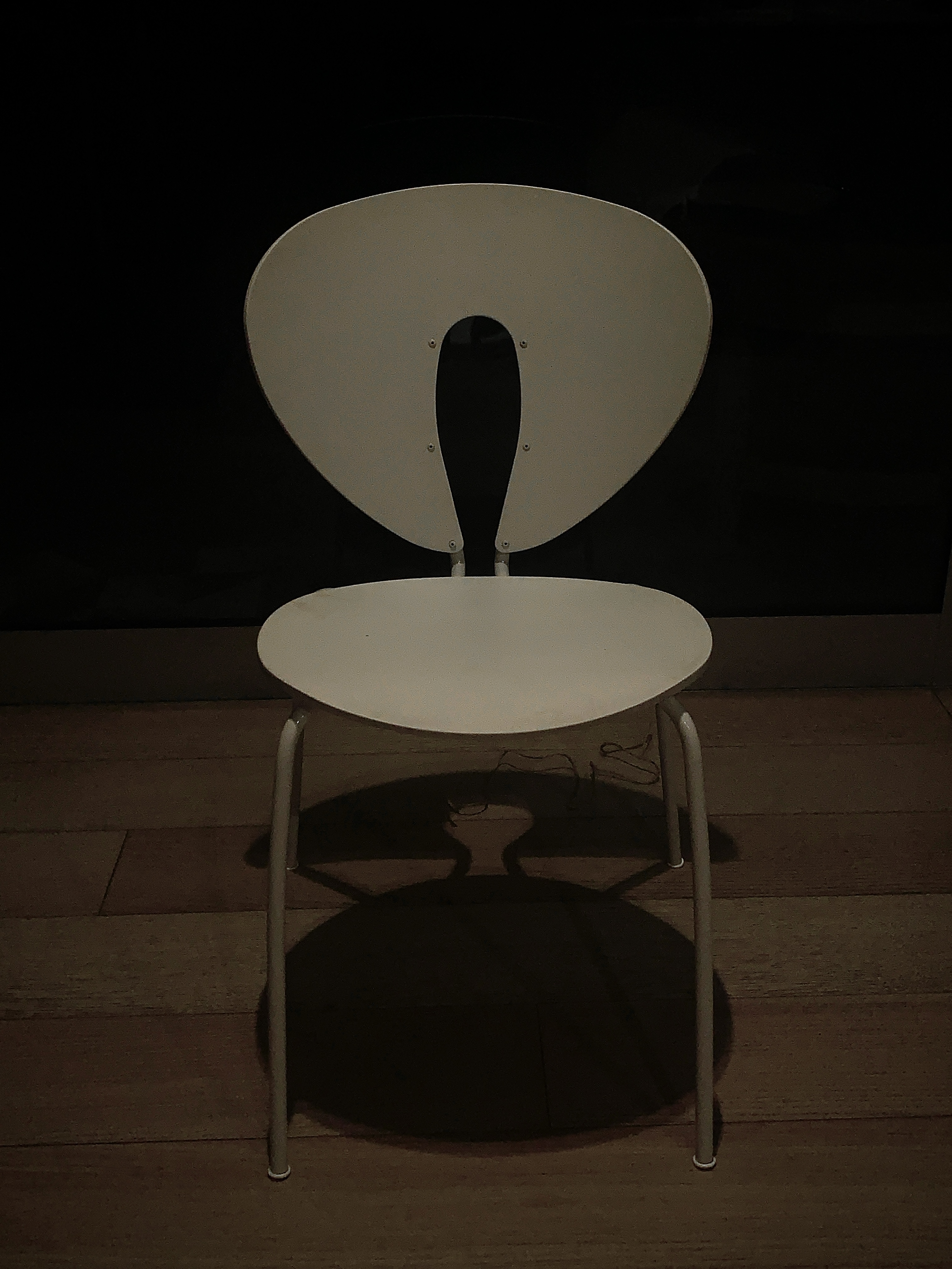 Creative study - Minimalist chair with dramatic lighting