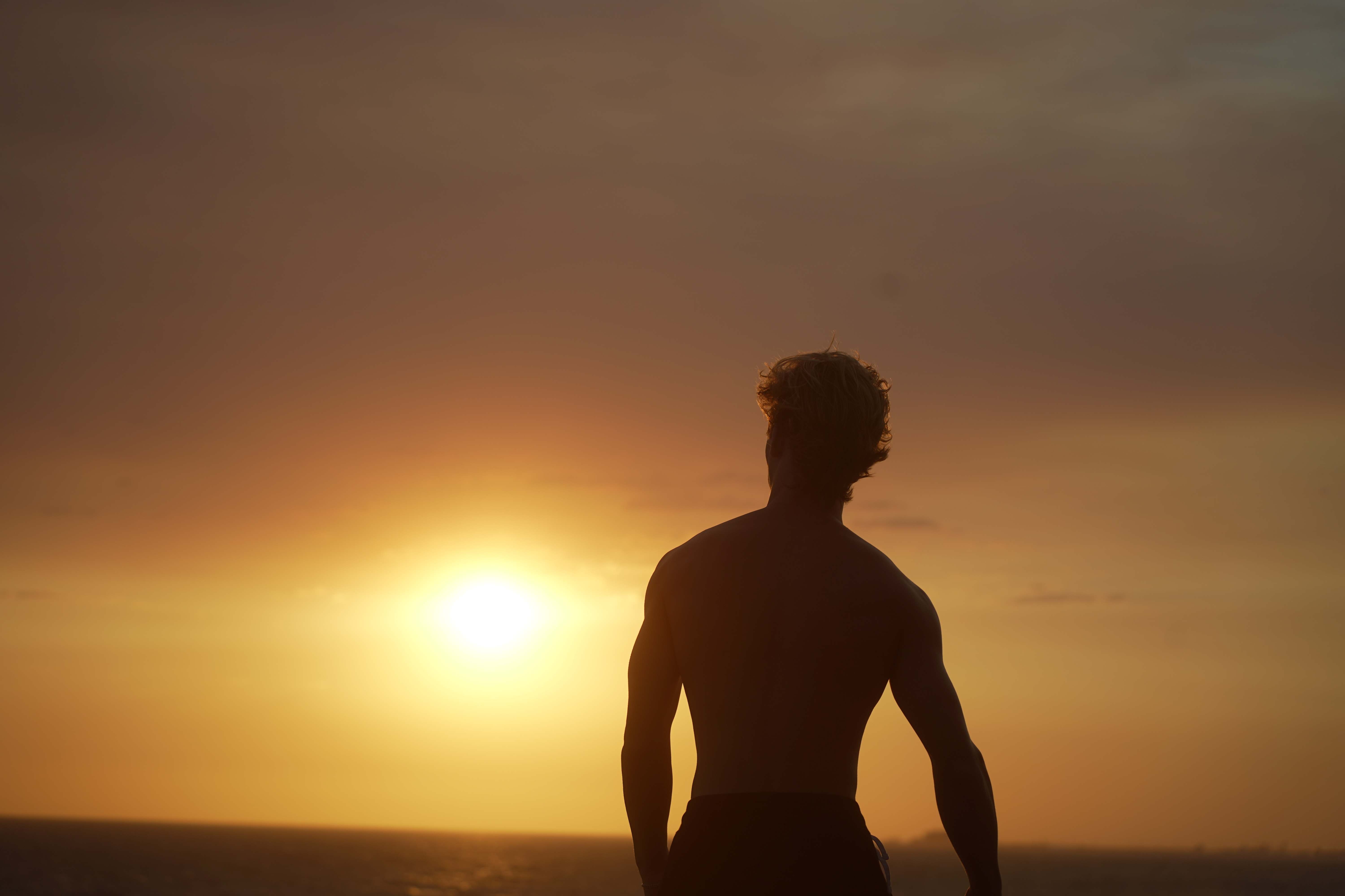 Portrait - Contemplative male silhouette against warm sunset