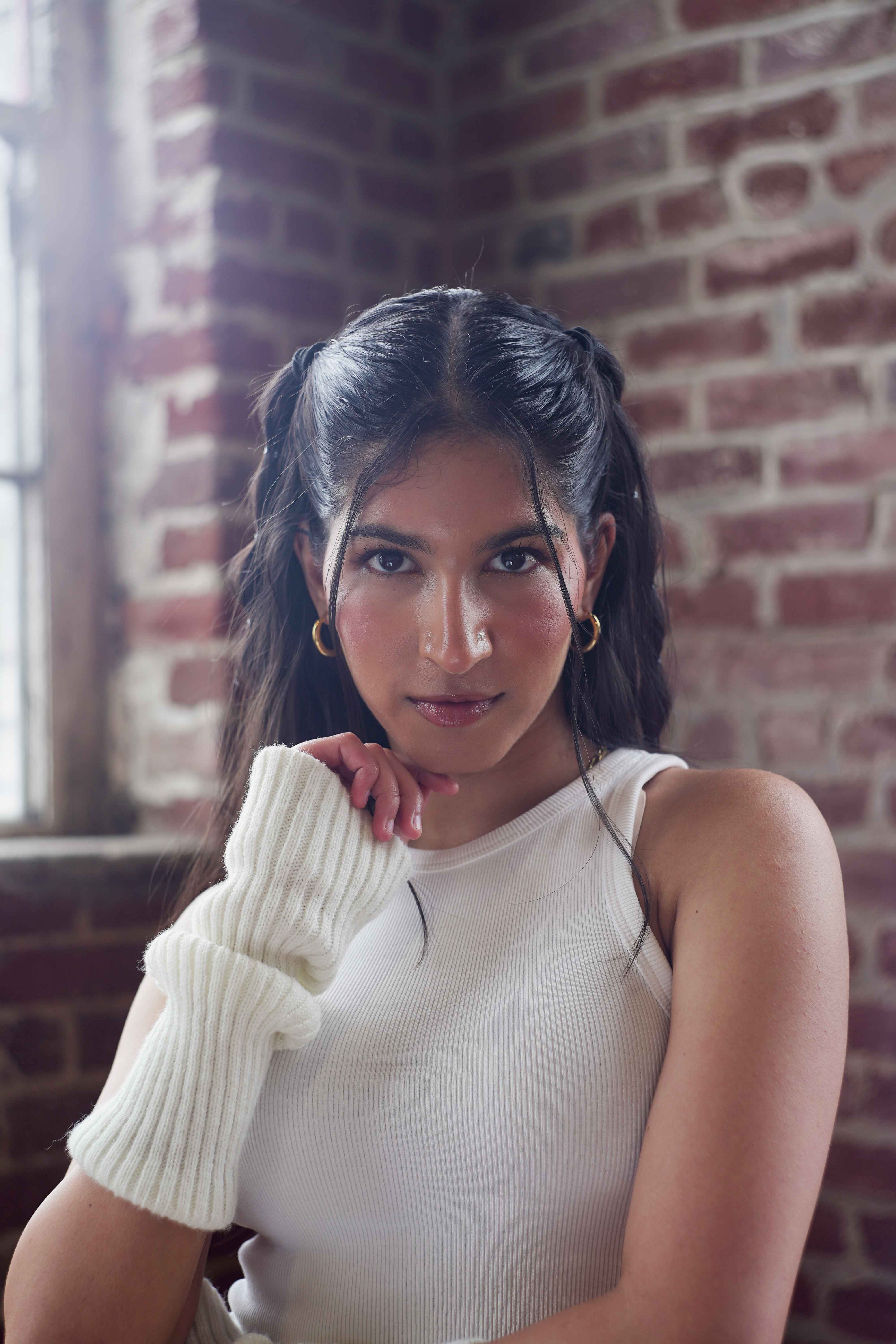 Portrait - Professional female portrait with elegant styling and brick wall background